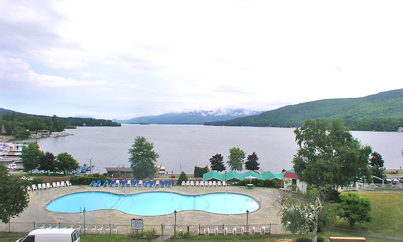 looking out over a pool onto lake george